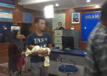 Pasangan suami isteri dipercayai melarikan bayi perempuan berusia lima hari. Foto -Ihsan polis