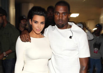 Kim Kardashian dan Kanye West. Foto -www.18karatreggae.com