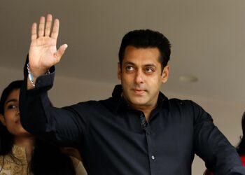 Indian Bollywood actor Salman Khan (2R) celebrates and wishes his fans Ramzan Eid Mubarak at his residence in Mumbai on July 18, 2015. AFP PHOTO (Photo credit should read STR/AFP/Getty Images)