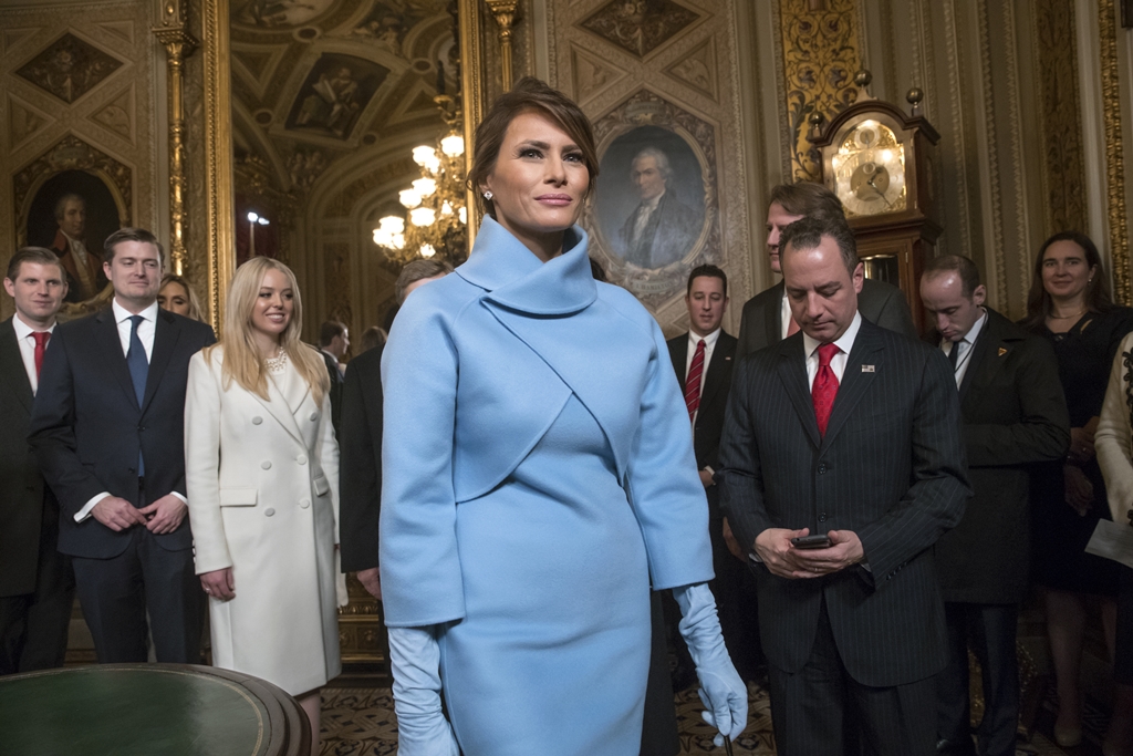Melania Trump, the wife of President Donald Trump, leaves the President's Room of the Senate, at the Capitol in Washington, Friday, Jan. 20, 2017, after President Trump signed his first legislation. (AP Photo/J. Scott Applewhite, Pool)